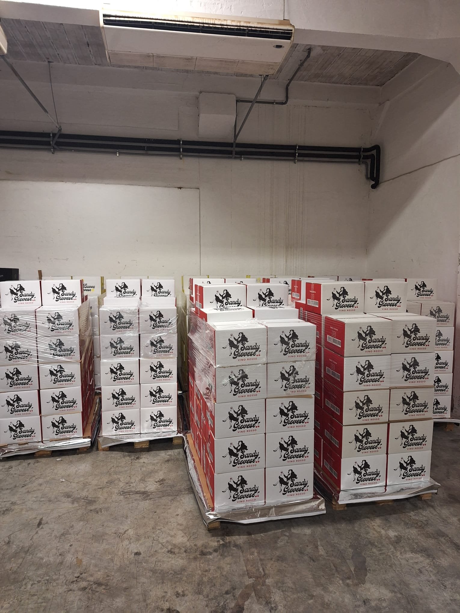 Palletized Giovese Family Wines boxes ready for shipment